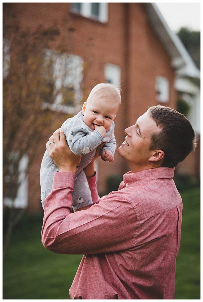 dad holding baby up at Abingdon Virginia Family Photo Shoot